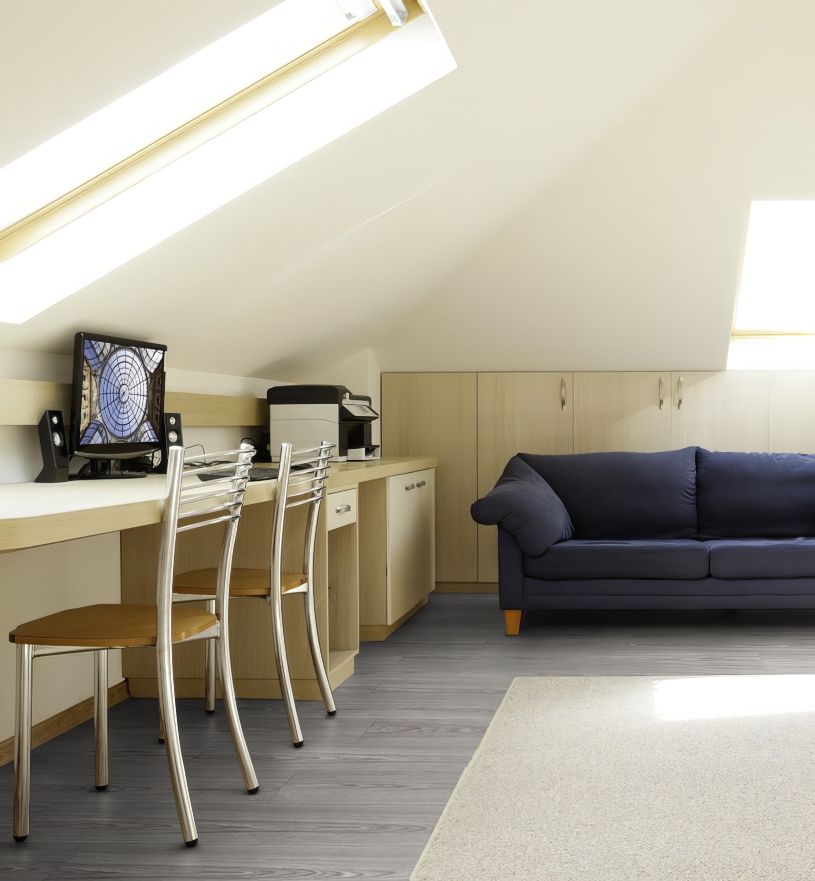 Editions Classic Windsor Grey: A contemporary interior featuring Pro-Tek™ Windsor Grey flooring, with its cool grey tones and elegant wood grain.