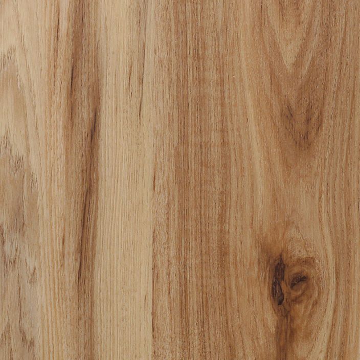 A flooring swatch of Cameron Oak, featuring a light, natural oak tone with visible grain details. The warm and airy appearance is ideal for creating bright, inviting spaces.
