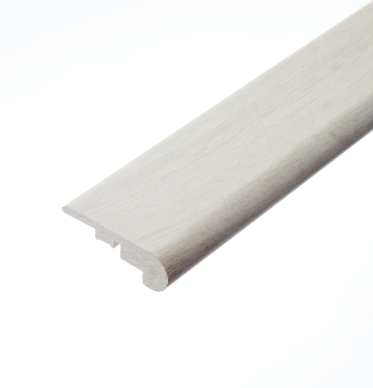 Bishops White Stair Nosing: A close-up view of the Bishops White stair nosing profile. This piece, with its pure white colour, is crafted to protect stair edges while providing a smooth and safe transition between steps.