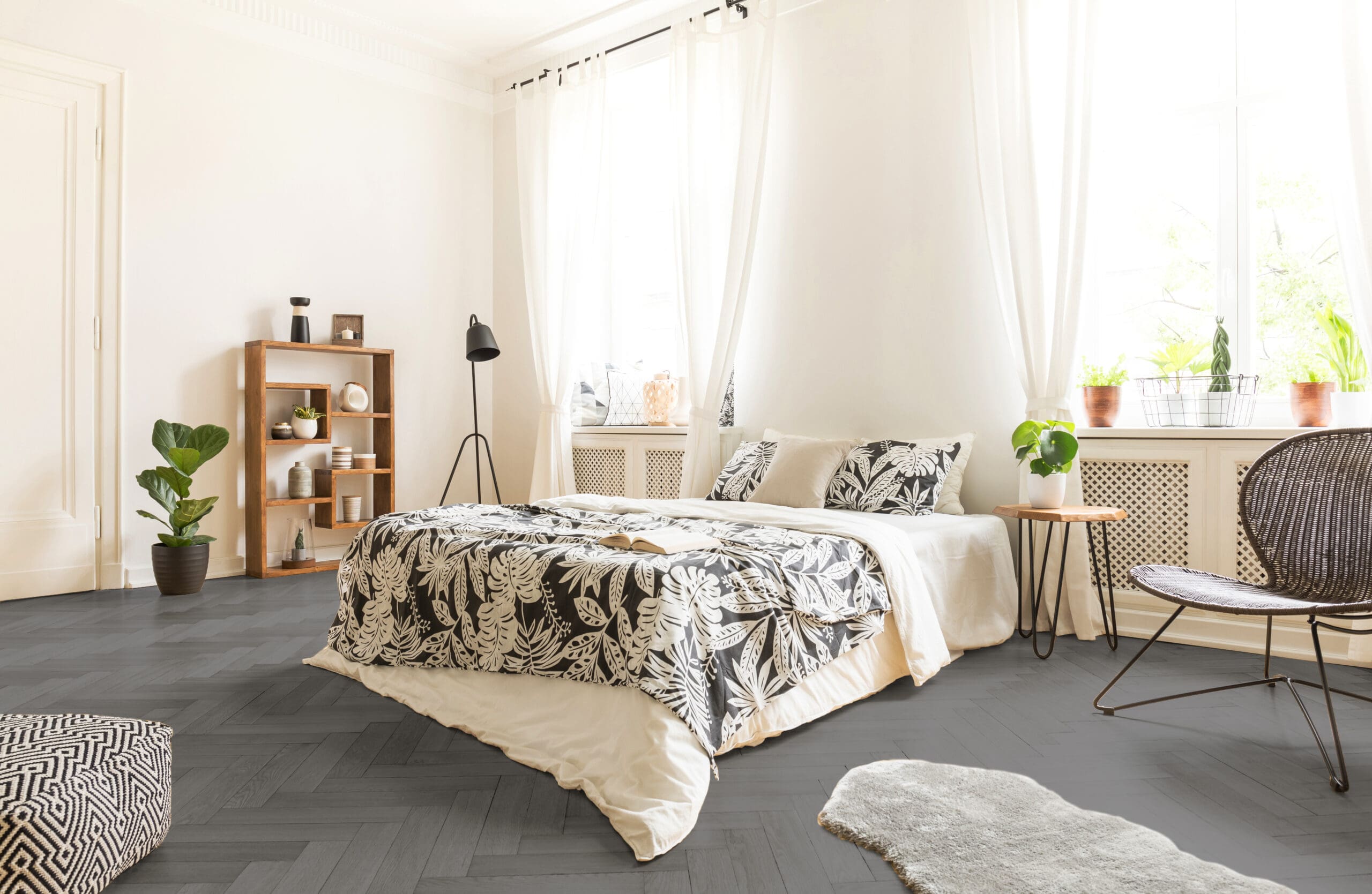 A detailed view of Windlesham Slate flooring, characterized by its cool grey tones and natural wood patterns. This versatile flooring provides a sleek, modern look while maintaining the warmth of wood.